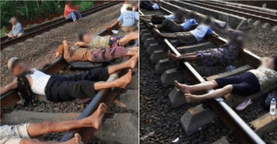 印尼村民纷纷排队躺铁轨 声称可治愈疾病